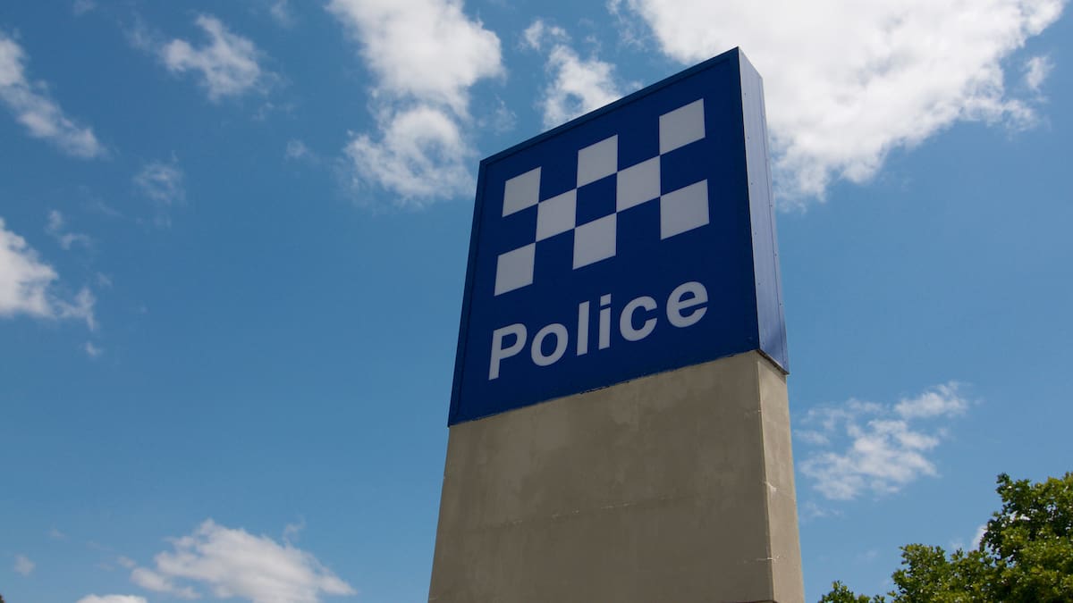 Police hunt gunman after woman shot dead in Queensland home