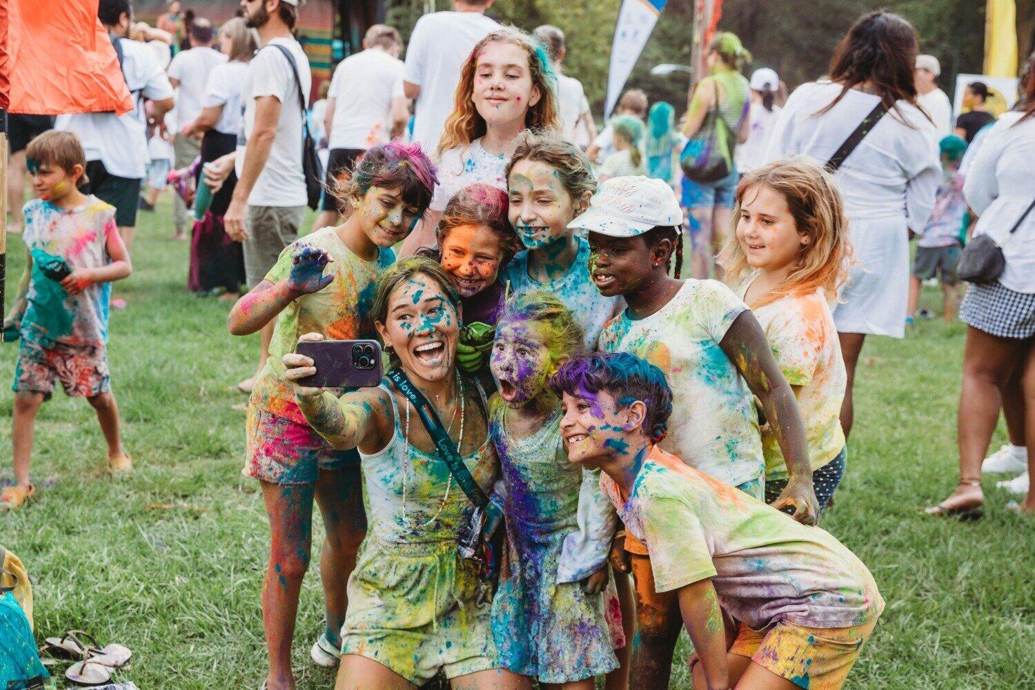  Getting the shot! Fun for all ages at the Holi Colour Splash. Photo/ Anna Menedez