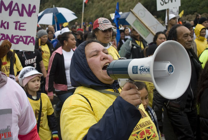 A marcher shouts encouragement to the hikoi. Photo / Richard Robinson