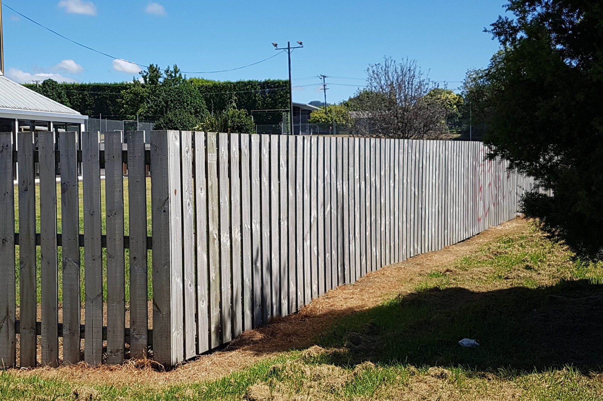  Before photo of the fence fronting Jellicoe St in front of Rangiuru Sports Club.