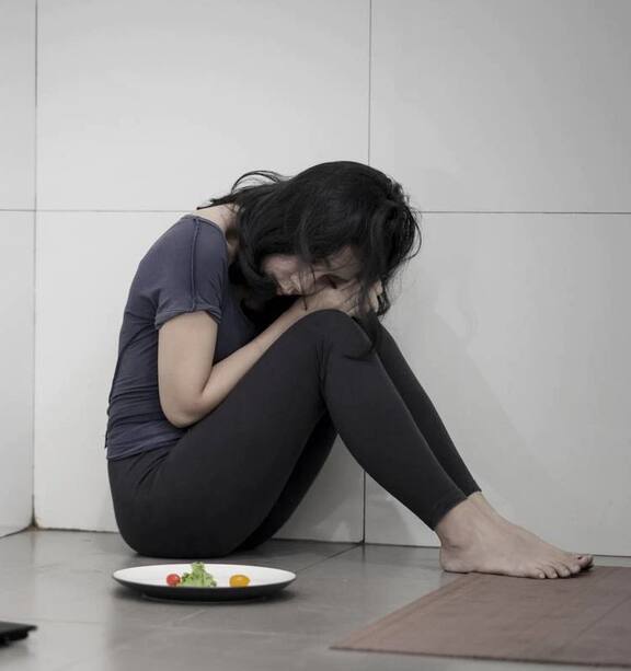 Woman takes eating disorder to the mat