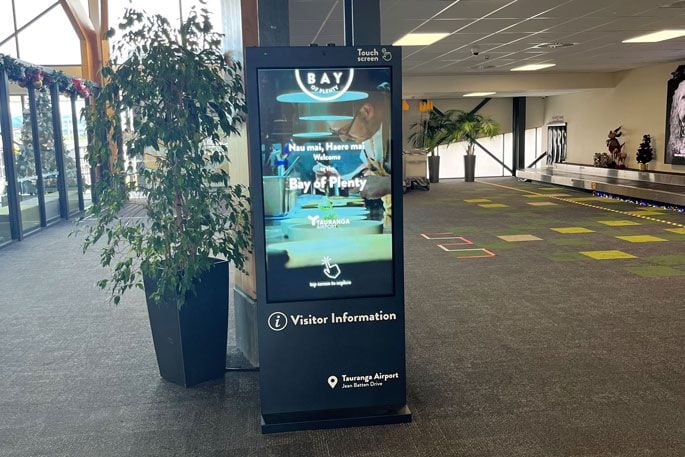 The new digital kiosk at the airport is strategically placed near the baggage claim area. Photo / Supplied