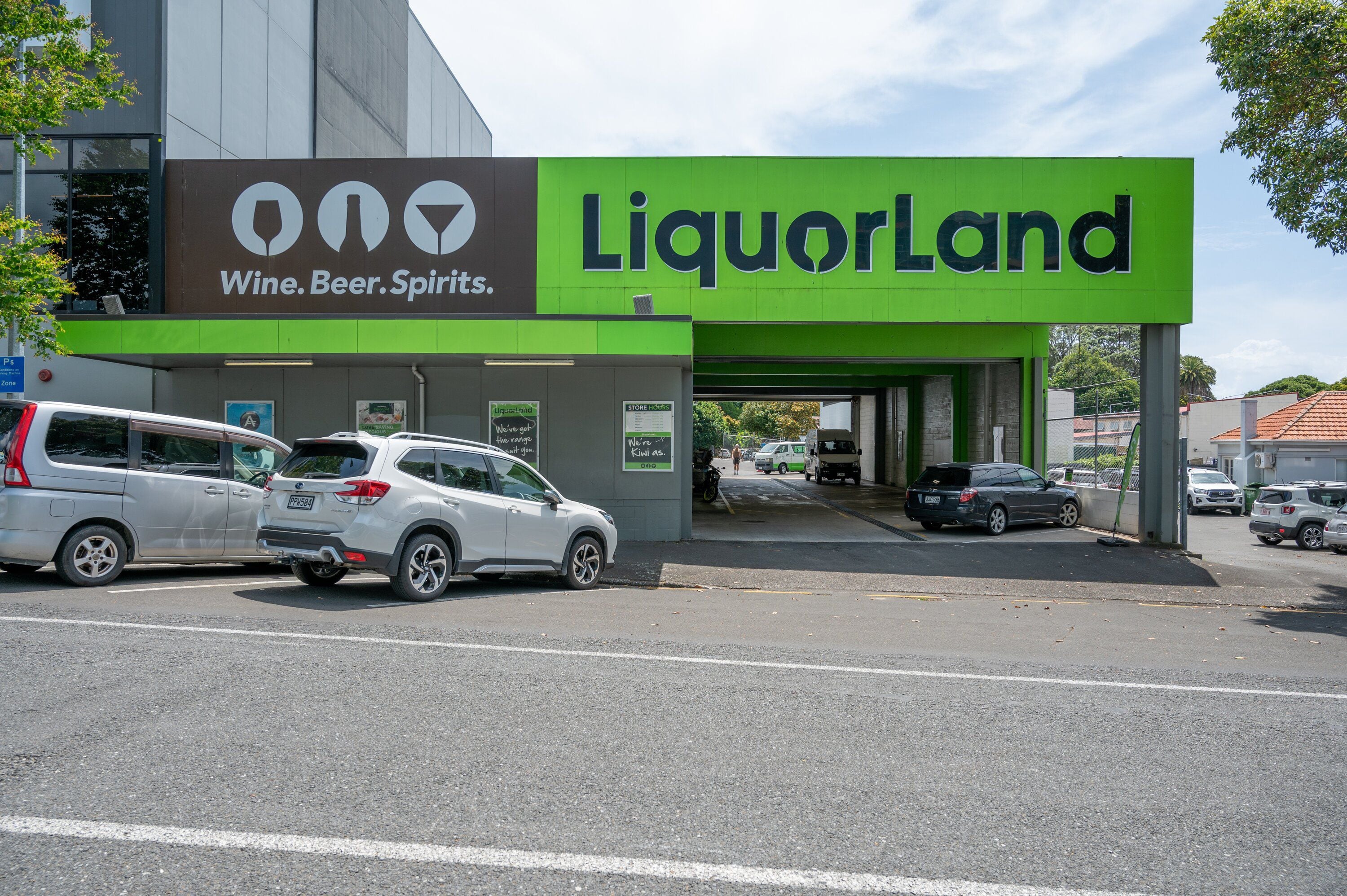 The owner of Liquorland on Harington St warns it could have its liquor licence revoked because of issues with a nearby bus stop. Photo / David Hall