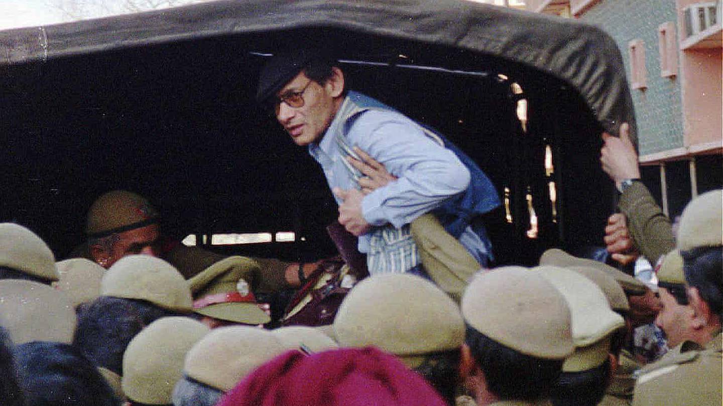 Charles Sobhraj is bundled into a police van in Delhi in 1997, shortly after his release from jail. Photo / AP
