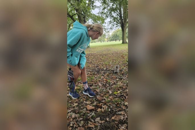 Sammie Clark feeds squirrels in London’s Hyde Park.